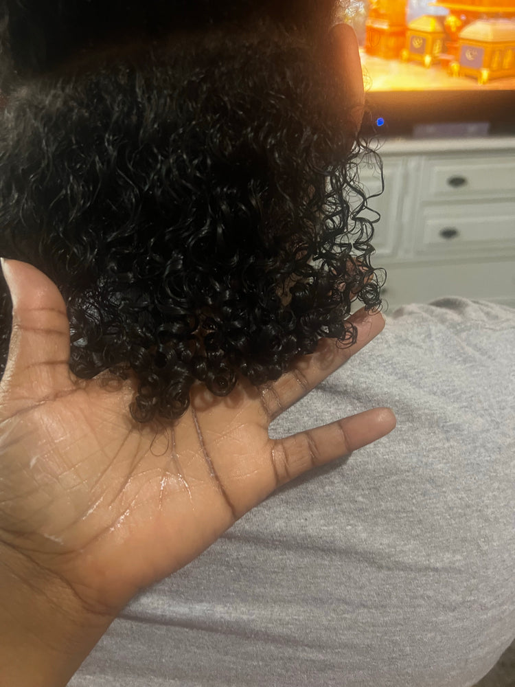 Curly hair moisturized by using moisture milk 